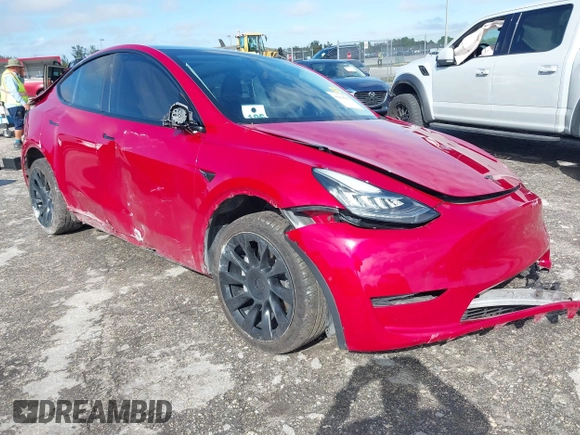 2022 Tesla Model Y Long Range z VIN 7SAYGDEE1NF385414, wystawiony jako IAAI lot #41660542 z przebiegiem 54 075 mil mil oraz . Historia ofert i sprzedaży dostępna na DreamBid. Obrazek 1.