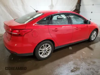 2015 Ford Focus SE with VIN 1FADP3F20FL205273, listed as a Copart auction lot 58627814 with 198,266 mi miles and Salvage title. Bid and sale history available at DreamBid. Image 3.