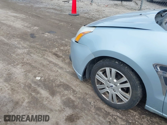 2009 Ford Focus SEL with VIN 1FAHP37N59W164619, listed as a IAAI auction lot 41762640 with 147,643 mi miles. Bid and sale history available at carsss.com. Image 6.
