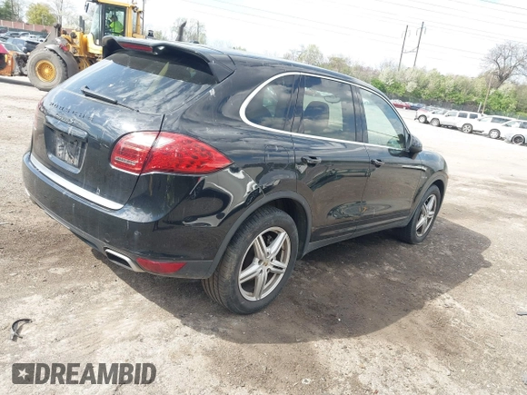 2011 Porsche Cayenne S Hybrid with VIN WP1AE2A27BLA91799, listed as a IAAI auction lot 42035613 with 131,480 mi miles. Bid and sale history available at carsss.com. Image 4.