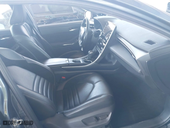 2019 Toyota Avalon Hybrid Limited with VIN 4T1B21FB4KU005887, listed as a IAAI auction lot 42014462 with 141,213 mi miles. Bid and sale history available at carsss.com. Image 5.