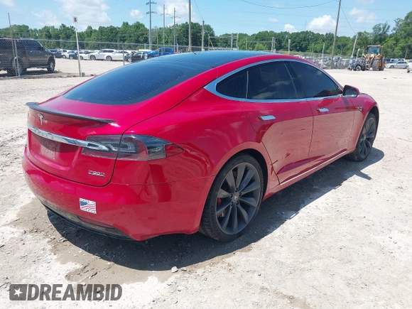 2016 Tesla Model S 90D with VIN 5YJSA1E48GF144821, listed as a IAAI auction lot 42206473 with 129,624 mi miles and . Bid and sale history available at DreamBid. Image 4.