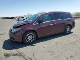 2013 Honda Odyssey EX-L with VIN 5FNRL5H65DB079659, listed as a Copart auction lot 52360445 with 169,058 mi miles and Salvage title. Bid and sale history available at DreamBid. Image 1.