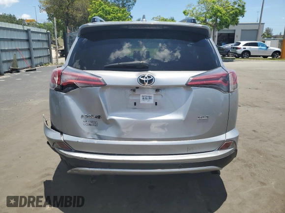 2018 Toyota RAV4 XLE with VIN JTMWFREV6JJ175916, listed as a Copart auction lot 57239285 with 118,001 mi miles and Non repairable. Bid and sale history available at DreamBid. Image 6.