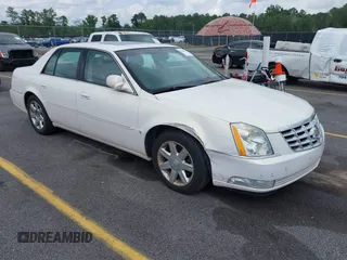 2007 Cadillac DTS Luxury I z VIN 1G6KD57Y67U123765, wystawiony jako IAAI lot #42495242 z przebiegiem 56 193 mil mil oraz . Historia ofert i sprzedaży dostępna na DreamBid. Obrazek 1.