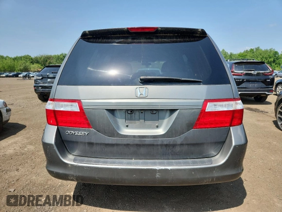 2007 Honda Odyssey LX z VIN 5FNRL38257B011710, wystawiony jako Copart lot #61163265 z przebiegiem 196 575 mil mil oraz Czysty tytuł • Clean title. Historia ofert i sprzedaży dostępna na DreamBid. Obrazek 6.