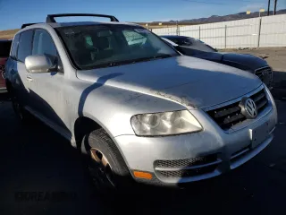 2004 Volkswagen Touareg z VIN WVGBC67L94D021426, wystawiony jako Copart lot #44059535 z przebiegiem 148 887 mil mil oraz Czysty tytuł • Clean title. Historia ofert i sprzedaży dostępna na DreamBid. Obrazek 4.