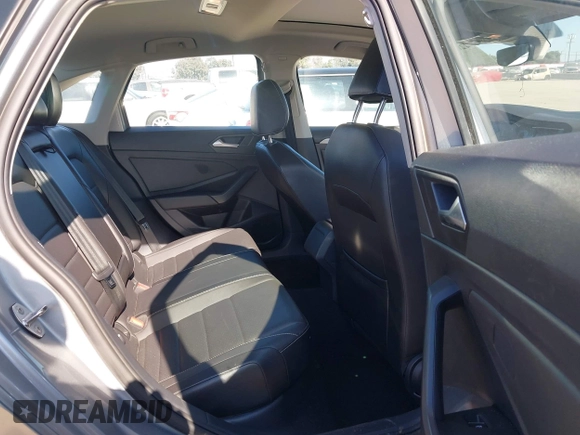 2022 Volkswagen Jetta SE with VIN 3VW7M7BU1NM019993, listed as a IAAI auction lot 42087376 with 74,596 mi miles and . Bid and sale history available at DreamBid. Image 8.