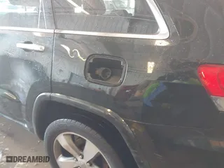 2014 Jeep Grand Cherokee Overland with VIN 1C4RJFCT7EC187319, listed as a IAAI auction lot 41256107 with 98,287 mi miles. Bid and sale history available at carsss.com. Image 6.