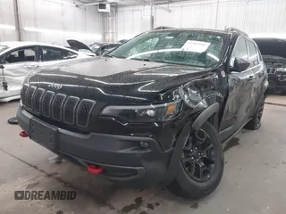 2019 Jeep Cherokee Trailhawk with VIN 1C4PJMBX9KD456748, listed as a IAAI auction lot 42367186 with 91,665 mi miles and . Bid and sale history available at DreamBid. Image 17.