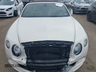 2015 Bentley Continental GT with VIN SCBGJ3ZAXFC044364, listed as a IAAI auction lot 39947673 with 3,514 mi miles and . Bid and sale history available at DreamBid. Image 13.