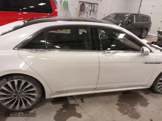 2017 Lincoln Continental Black Label with VIN 1LN6L9BC9H5637539, listed as a IAAI auction lot 41516006 with 163,223 mi miles. Bid and sale history available at carsss.com. Image 13.