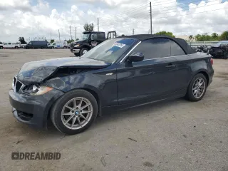 2011 BMW 1 Series 128i with VIN WBAUN1C5XBVH83530, listed as a Copart auction lot 66342954 with 263,641 mi miles and Salvage Title. Bid and sale history available at carsss.com. Image 1.