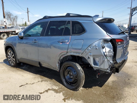 2023 Toyota Corolla Cross XLE with VIN 7MUDAAAG0PV063242, listed as a Copart auction lot 52511585 with 10,695 mi miles and Salvage title. Bid and sale history available at DreamBid. Image 2.
