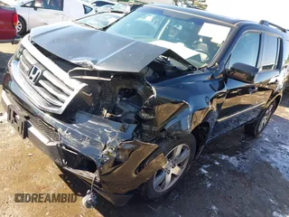 2015 Honda Pilot Touring with VIN 5FNYF3H97FB016390, listed as a IAAI auction lot 41753590 with 217,156 mi miles. Bid and sale history available at carsss.com. Image 18.