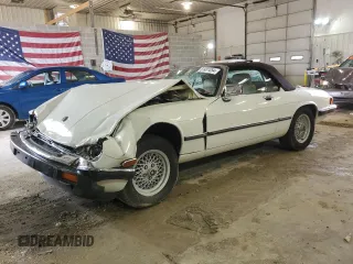 1989 Jaguar XJS z VIN SAJNV4847KC151989, wystawiony jako Copart lot #61401054 z przebiegiem 80 570 mil mil oraz Szkody całkowita. Historia ofert i sprzedaży dostępna na DreamBid. Obrazek 1.