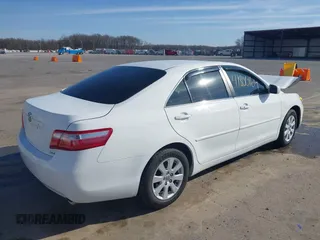 2009 Toyota Camry LE with VIN 4T1BK46K89U582997, listed as a IAAI auction lot 41800164 with 243,922 mi miles. Bid and sale history available at carsss.com. Image 4.
