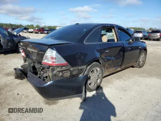 2008 Ford Taurus Limited with VIN 1FAHP25W68G183341, listed as a Copart auction lot 85331884 with 143,424 mi miles and Salvage Title. Bid and sale history available at carsss.com. Image 3.