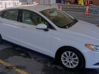2015 Ford Fusion S with VIN 1FA6P0G7XF5127770, listed as a IAAI auction lot 42845978 with 150,942 mi miles and . Bid and sale history available at DreamBid. Image 27.