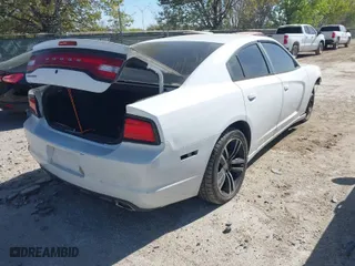 2014 Dodge Charger Police with VIN 2C3CDXAT7EH186677, listed as a IAAI auction lot 41855513 with 147,820 mi miles. Bid and sale history available at carsss.com. Image 4.