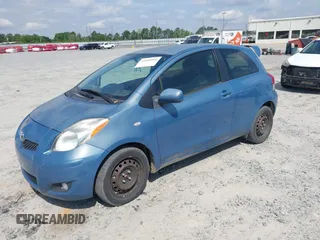 2009 Toyota Yaris with VIN JTDJT903X95227092, listed as a IAAI auction lot 42018166 with 120,605 mi miles. Bid and sale history available at carsss.com. Image 2.