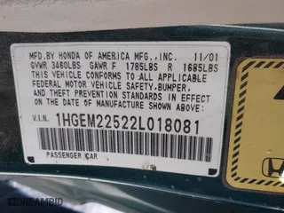 2002 Honda Civic LX with VIN 1HGEM22522L018081, listed as a IAAI auction lot 41329541 with 87,534 mi miles. Bid and sale history available at carsss.com. Image 9.