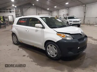 2008 Scion xD with VIN JTKKU10438J008405, listed as a IAAI auction lot 41698775 with 100,565 mi miles. Bid and sale history available at carsss.com. Image 1.
