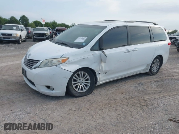 2011 Toyota Sienna XLE AAS with VIN 5TDYK3DC8BS108689, listed as a IAAI auction lot 42308965 with 179,524 mi miles and . Bid and sale history available at DreamBid. Image 2.