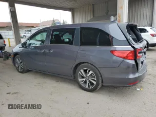 2022 Honda Odyssey Touring with VIN 5FNRL6H85NB023052, listed as a Copart auction lot 50884735 with 54,952 mi miles and Salvage Title. Bid and sale history available at DreamBid. Image 2.