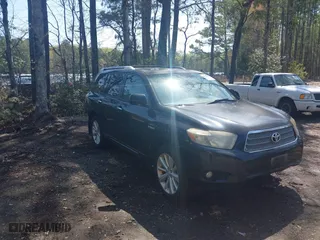 2009 Toyota Highlander Hybrid Limited with VIN JTEEW44A392034364, listed as a IAAI auction lot 41942117 with 221,186 mi miles. Bid and sale history available at carsss.com. Image 1.