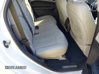 2014 Cadillac SRX Performance Collection with VIN 3GYFNFE30ES586713, listed as a IAAI auction lot 41791356 with 74,927 mi miles and . Bid and sale history available at DreamBid. Image 8.