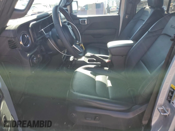 2024 Jeep Wrangler Sahara with VIN 1C4RJXP63RW195206, listed as a Copart auction lot 48784595 with 10,737 mi miles and Salvage Title. Bid and sale history available at DreamBid. Image 7.