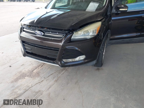 2013 Ford Escape Titanium z VIN 1FMCU0J95DUD22433, wystawiony jako IAAI lot #42495946 z przebiegiem 219 449 mil mil oraz . Historia ofert i sprzedaży dostępna na DreamBid. Obrazek 6.