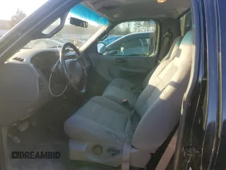 2002 Ford F-150 XL with VIN 1FTRF18232NA58109, listed as a Copart auction lot 88929065 with 148,228 mi miles and Salvage title. Bid and sale history available at DreamBid. Image 7.