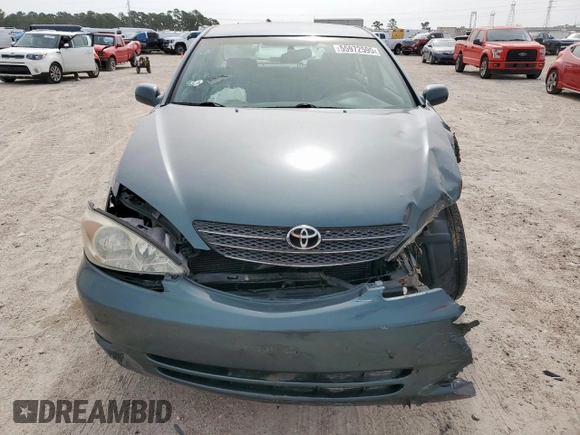 2003 Toyota Camry LE z VIN 4T1BF32K13U554339, wystawiony jako Copart lot #55972595 z przebiegiem 69 549 mil mil oraz Szkoda całkowita • Salvage title. Historia ofert i sprzedaży dostępna na DreamBid. Obrazek 5.