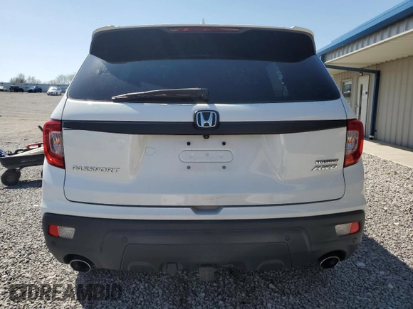 2019 Honda Passport Touring z VIN 5FNYF8H95KB023801, wystawiony jako Copart lot #51888605 z przebiegiem 77 060 mil mil oraz Szkoda całkowita • Salvage title. Historia ofert i sprzedaży dostępna na DreamBid. Obrazek 6.