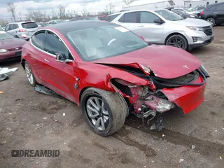 2019 Tesla Model 3 Long Range with VIN 5YJ3E1EB9KF365960, listed as a IAAI auction lot 41877026 with 59,101 mi miles. Bid and sale history available at carsss.com. Image 1.