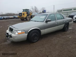2004 Mercury Grand Marquis GS with VIN 2MEFM74W34X649223, listed as a Copart auction lot 51854155 with 124,398 mi miles and Salvage Title. Bid and sale history available at carsss.com. Image 1.