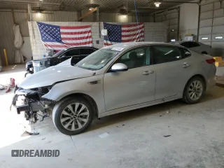 2016 Kia Optima LX с VIN 5XXGT4L35GG035838, выставлен на аукционе Copart как лот 59261495 с пробегом 128 848 миль миль и Списание • Salvage title. История ставок и продаж доступна на DreamBid. Изображение 1.