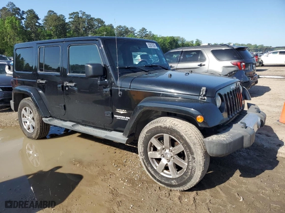 2013 Jeep Wrangler Unlimited Sahara with VIN 1C4HJWEG5DL585896, listed as a Copart auction lot 52007635 with 101,465 mi miles and Salvage Title. Bid and sale history available at carsss.com. Image 4.