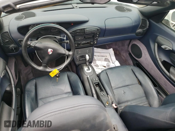 2001 Porsche Boxster z VIN WP0CA29821U622592, wystawiony jako Copart lot #56050735 z przebiegiem Nie podano mil oraz Szkoda całkowita • Salvage title. Historia ofert i sprzedaży dostępna na DreamBid. Obrazek 8.