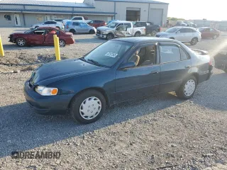 1998 Toyota Corolla VE with VIN 2T1BR18E5WC085808, listed as a Copart auction lot 62107565 with 283,961 mi miles and Salvage title. Bid and sale history available at DreamBid. Image 1.