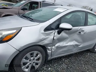 2014 Kia Rio LX with VIN KNADM4A31E6327403, listed as a IAAI auction lot 41915952 with 127,167 mi miles. Bid and sale history available at carsss.com. Image 6.