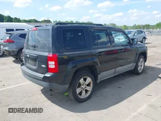2011 Jeep Patriot Latitude with VIN 1J4NF1GB1BD100499, listed as a IAAI auction lot 42113428 with 195,123 mi miles and . Bid and sale history available at carsss.com. Image 4.