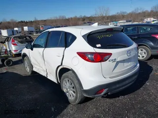 2016 Mazda CX-5 Touring with VIN JM3KE4CYXG0917841, listed as a IAAI auction lot 41420641 with 75,710 mi miles. Bid and sale history available at carsss.com. Image 3.