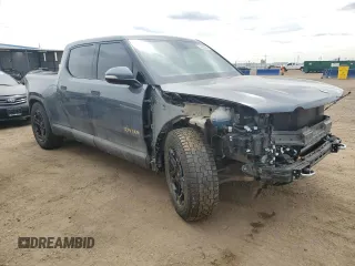 2023 Rivian R1T Adventure with VIN 7FCTGAAA3PN000801, listed as a Copart auction lot 51600895 with 19,486 mi miles and Salvage Title. Bid and sale history available at carsss.com. Image 4.