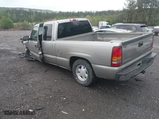 2003 GMC Sierra 1500 SLE with VIN 2GTEC19V231251709, listed as a IAAI auction lot 41973137 with 101,934 mi miles. Bid and sale history available at carsss.com. Image 3.