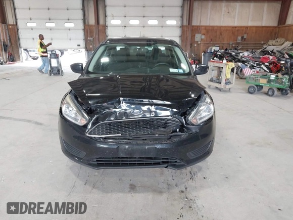 2018 Ford Focus SE with VIN 1FADP3FE8JL209560, listed as a IAAI auction lot 42707236 with 166,017 mi miles and . Bid and sale history available at DreamBid. Image 12.