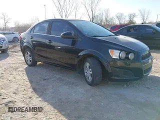 2012 Chevrolet Sonic LT with VIN 1G1JC5SHXC4163448, listed as a IAAI auction lot 41777660 with 103,854 mi miles and . Bid and sale history available at DreamBid. Image 1.