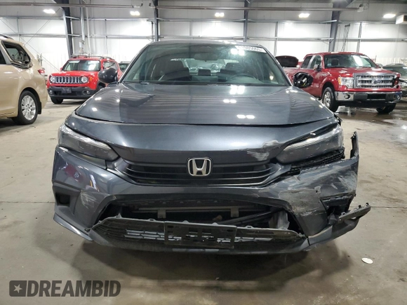 2023 Honda Civic Sport z VIN 2HGFE2F58PH543002, wystawiony jako Copart lot #53985065 z przebiegiem 11 015 mil mil oraz Szkoda całkowita • Salvage title. Historia ofert i sprzedaży dostępna na DreamBid. Obrazek 5.